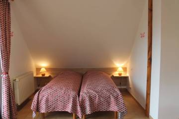 deux lits jumeaux dans la mezzanine